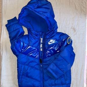 Nike, blue puffer jacket.